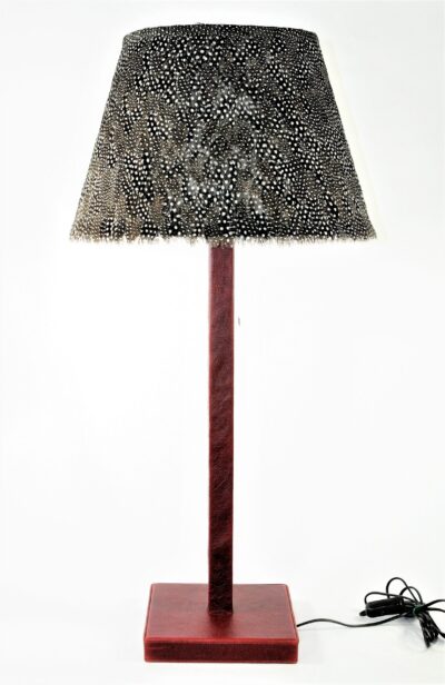 Guinea fowl feathers on boxed leather table lamp